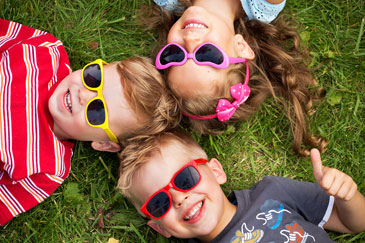 Cheerful Kids Wearing Sunglasses Outside